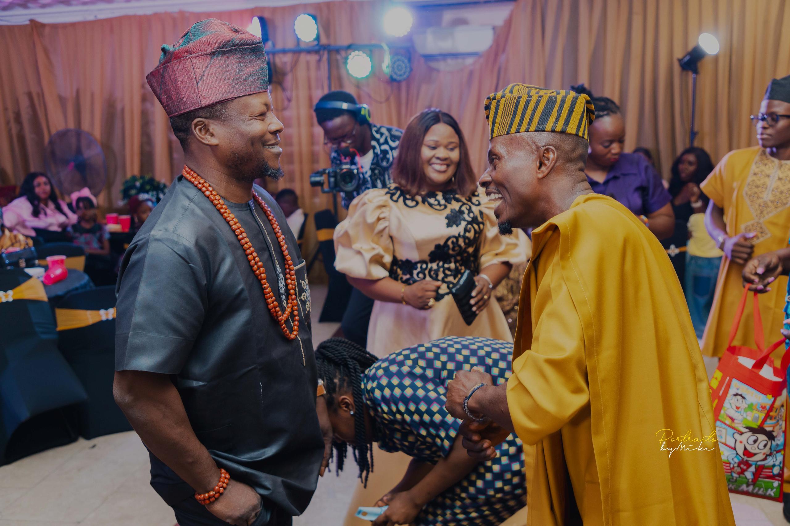 Femi Bello and Mr. Bello